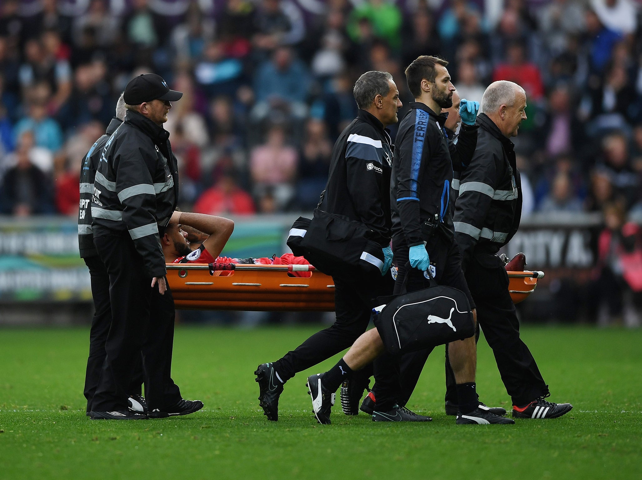 Williams was stretchered off for Huddersfield