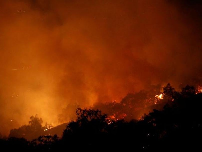 The Pocket wildfire burns in the hills above Geyserville, California, U.S