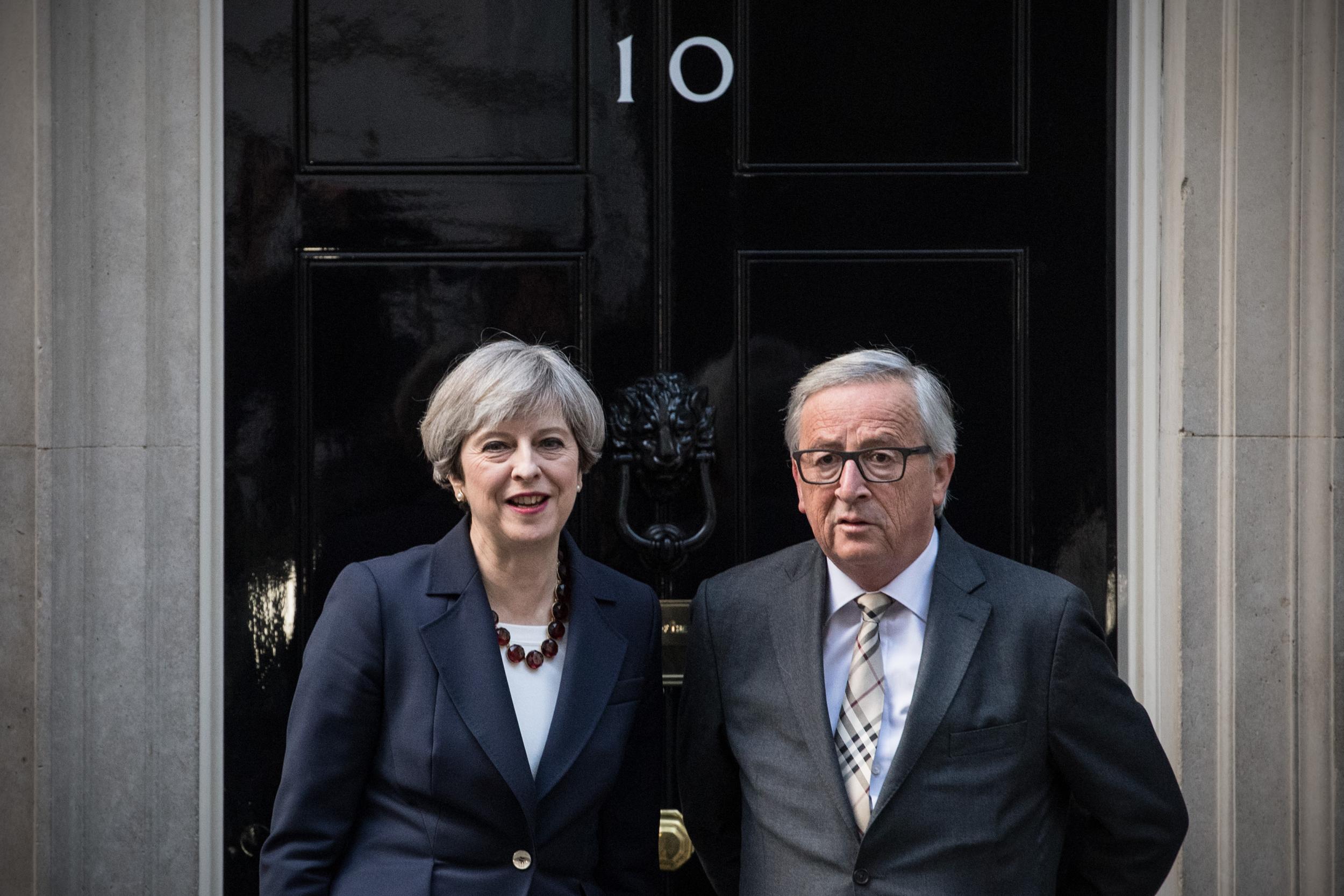 Theresa May at a meeting with Jean Claude Juncker earlier this year