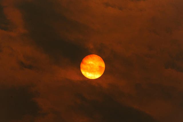 An orange sun in the sky at Builth Wells, Wales