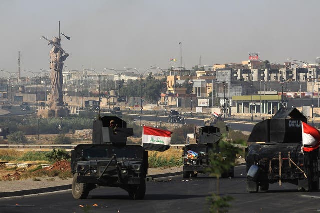 Iraqi forces seized the Kirkuk governor's office, key military sites and an oil field as they swept across the disputed province following soaring tensions over an independence referendum