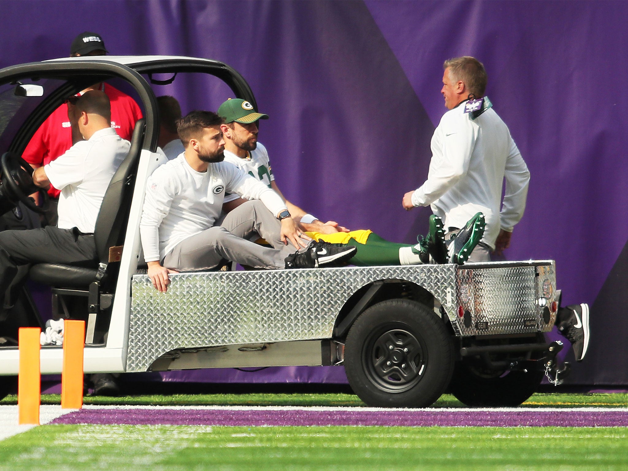 Aaron Rodgers is taken off injured on a cart after breaking his collarbone