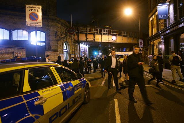 Police at the scene outside Parsons Green Tube station in London where three men were stabbed