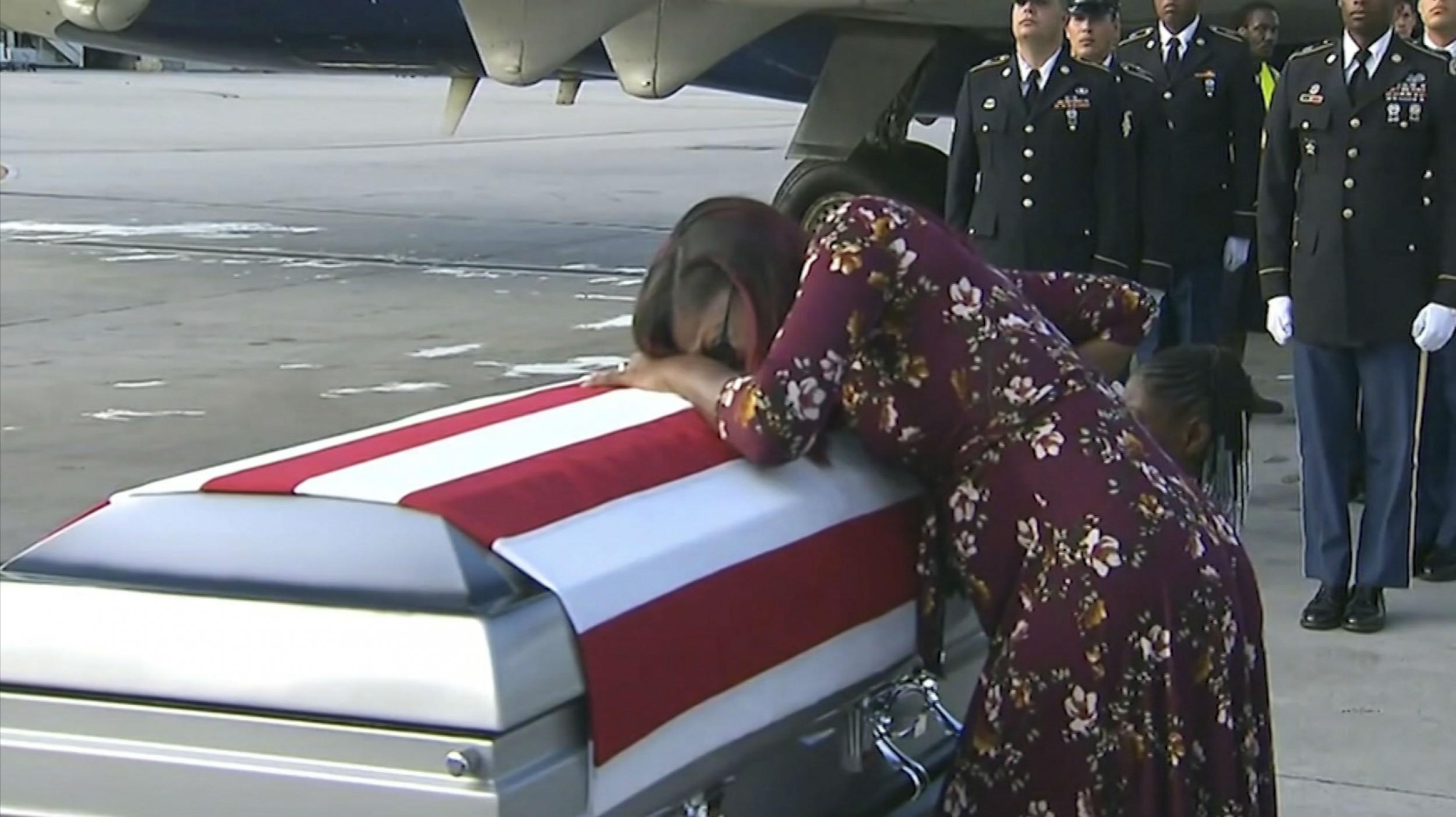 Mr Trump spoke with Myesha Johnson, the widow of Lance Sergeant David Johnson, as she was on the way to meet his casket
