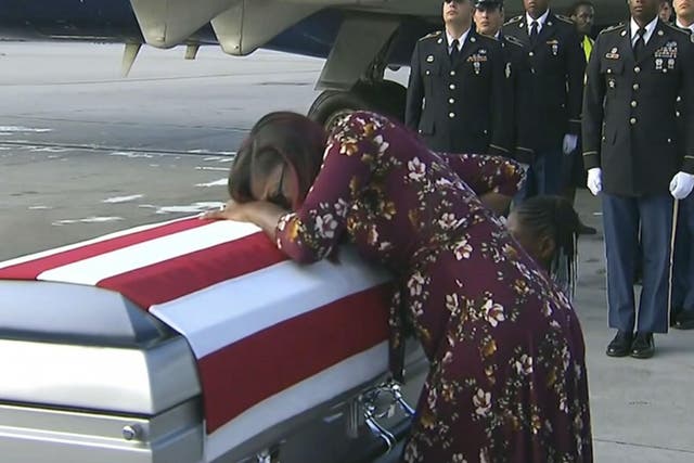 Mr Trump spoke with Myesha Johnson, the widow of Lance Sergeant David Johnson, as she was on the way to meet his casket