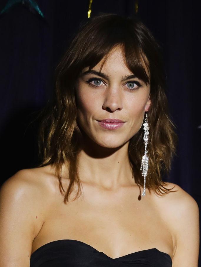 Alexa Chung is arguably the queen of the curtain fringe (Getty)