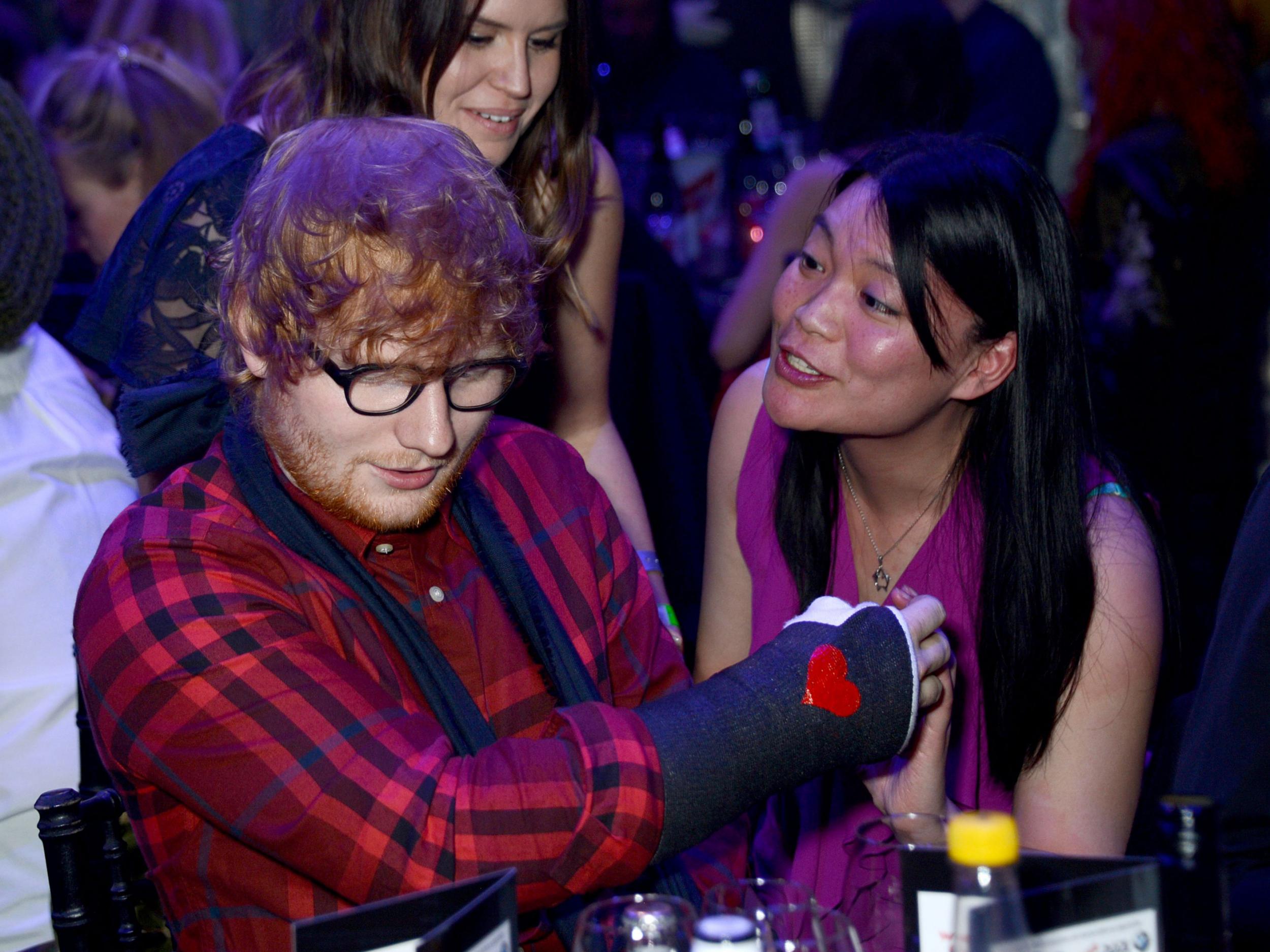 Ed Sheeran sporting his cast at the Q Awards