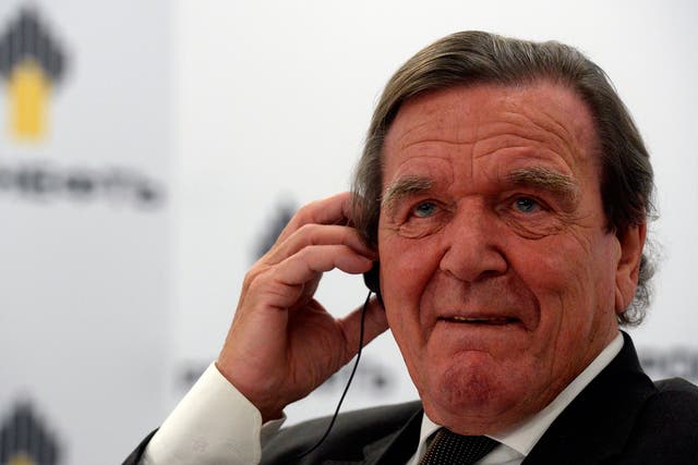 Former German Chancellor Gerhard Schroeder attends a briefing in Saint Petersburg after becoming chairman of Rosneft, the state-controlled energy giant with links to Vladimir Putin
