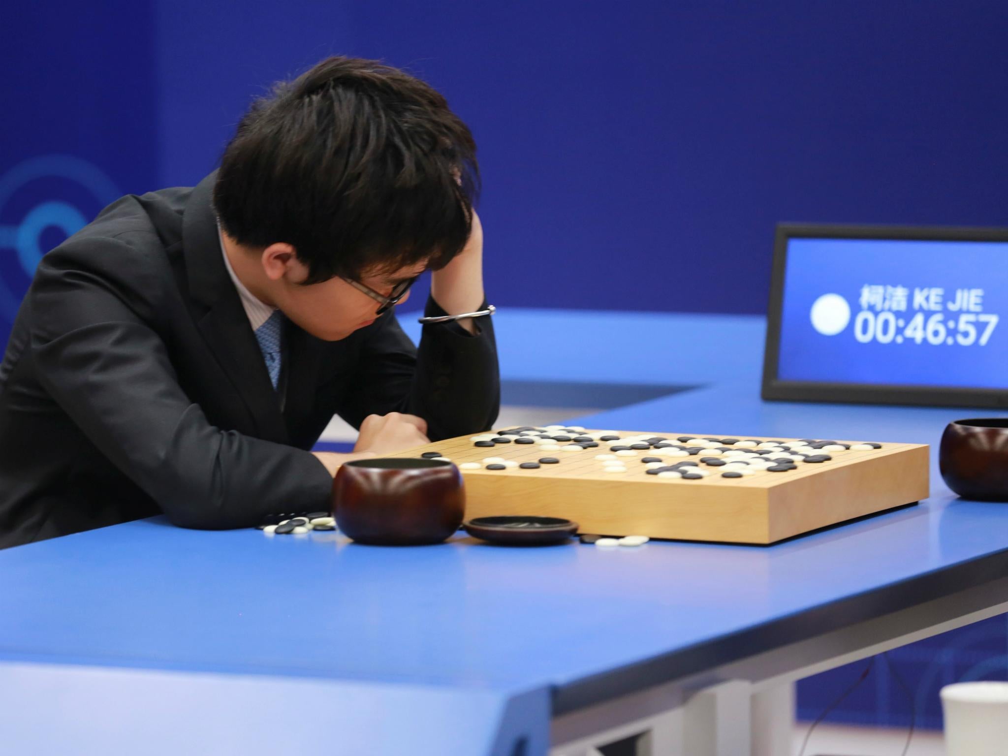 Chinese Go player Ke Jie reacts during his second match against Google's artificial intelligence program AlphaGo at the Future of Go Summit in Wuzhen, Zhejiang province, China May 25, 2017