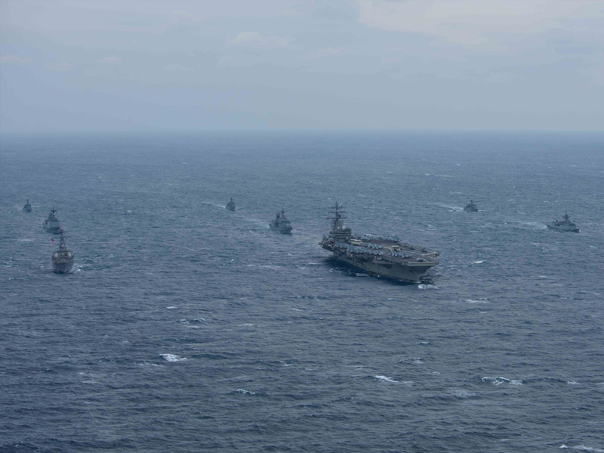 USS Ronald Reagan alongside South Korean ships in waters east of the Korean Peninsula