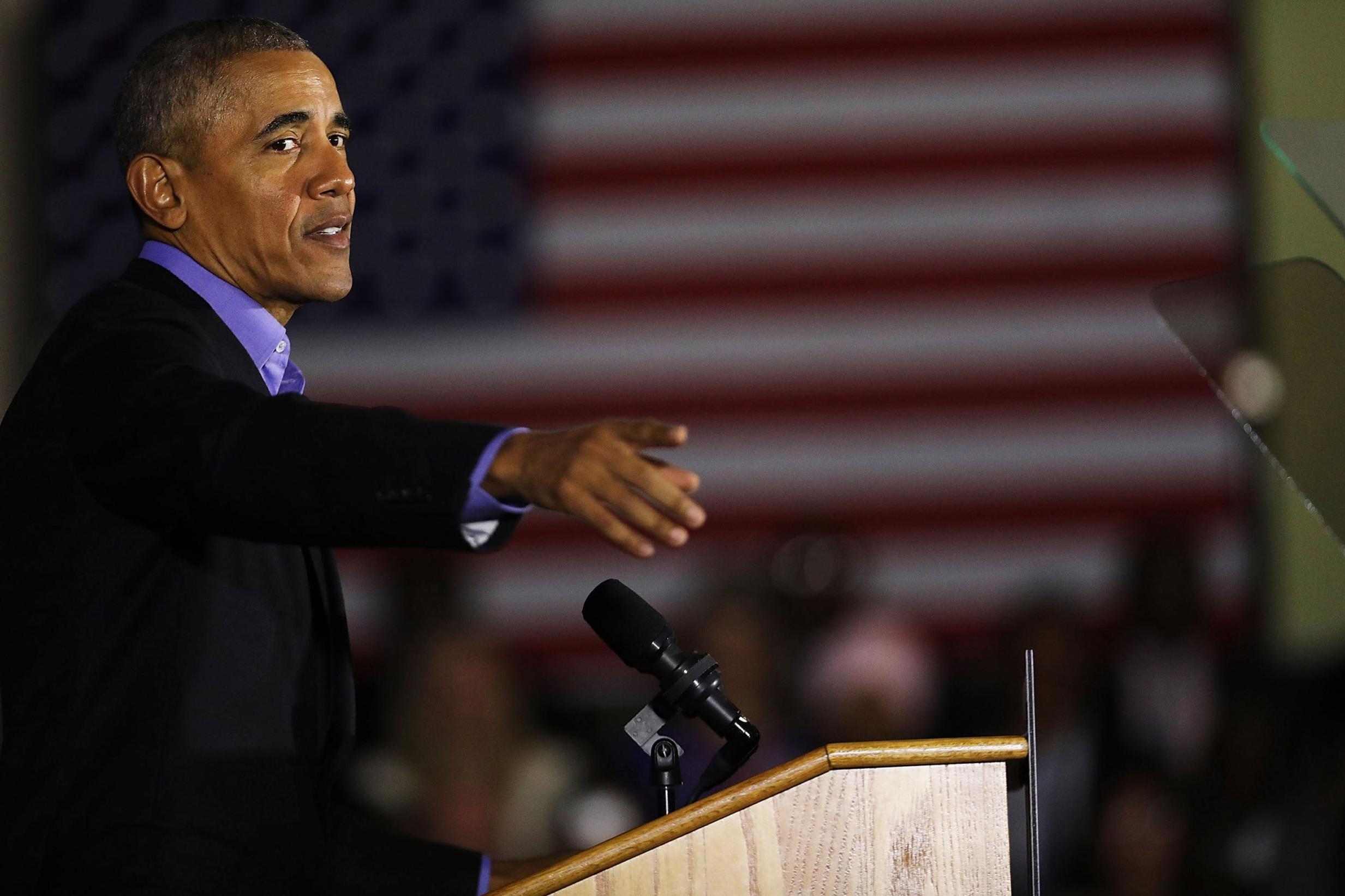 Barack Obama implied Donald Trump had set the US 'back 50 years' as a he spoke at a political rally in Newark, New Jersey