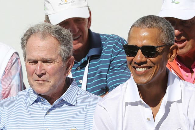 George W Bush and Barack Obama attend the Presidents Cup at Liberty National Golf Club on September 28, 2017 in Jersey City, New Jersey