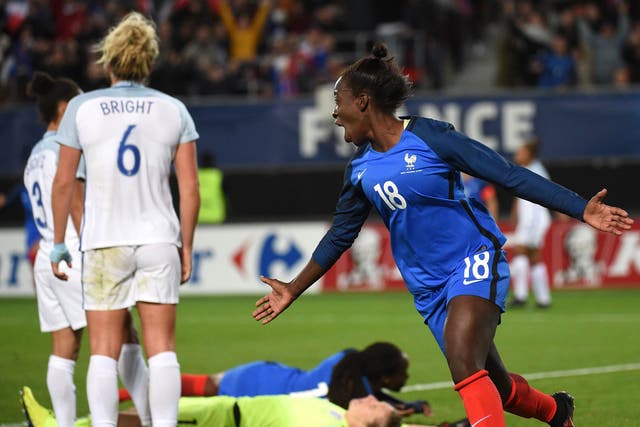 France's Viviane Asseyi celebrates after scoring during the friendly football match between France and England at the Hainaut Stadium in Valenciennes on 20 October