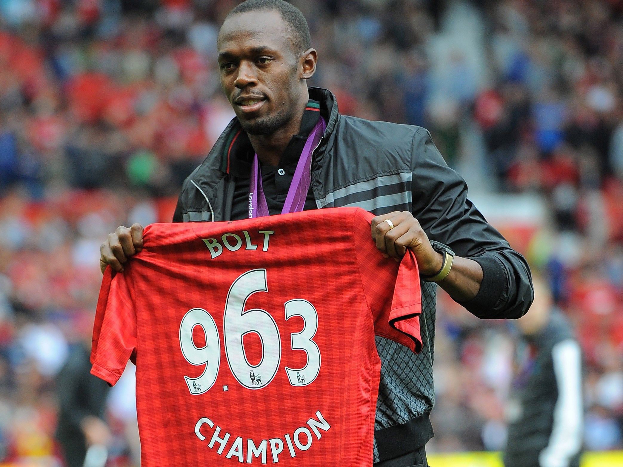 Usain Bolt wants to play for Manchester United one day