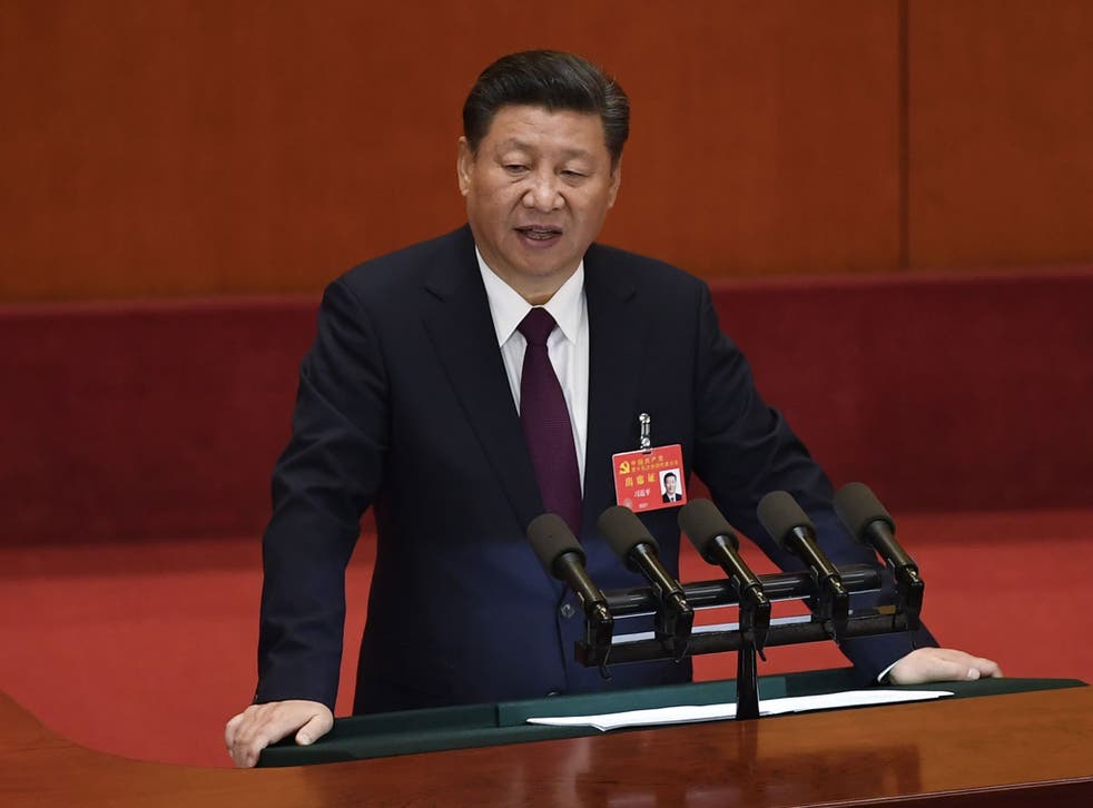 Chinese President Xi Jinping delivers a speech at the opening session of the Chinese Communist Party's Congress at the Great Hall of the People in Beijing