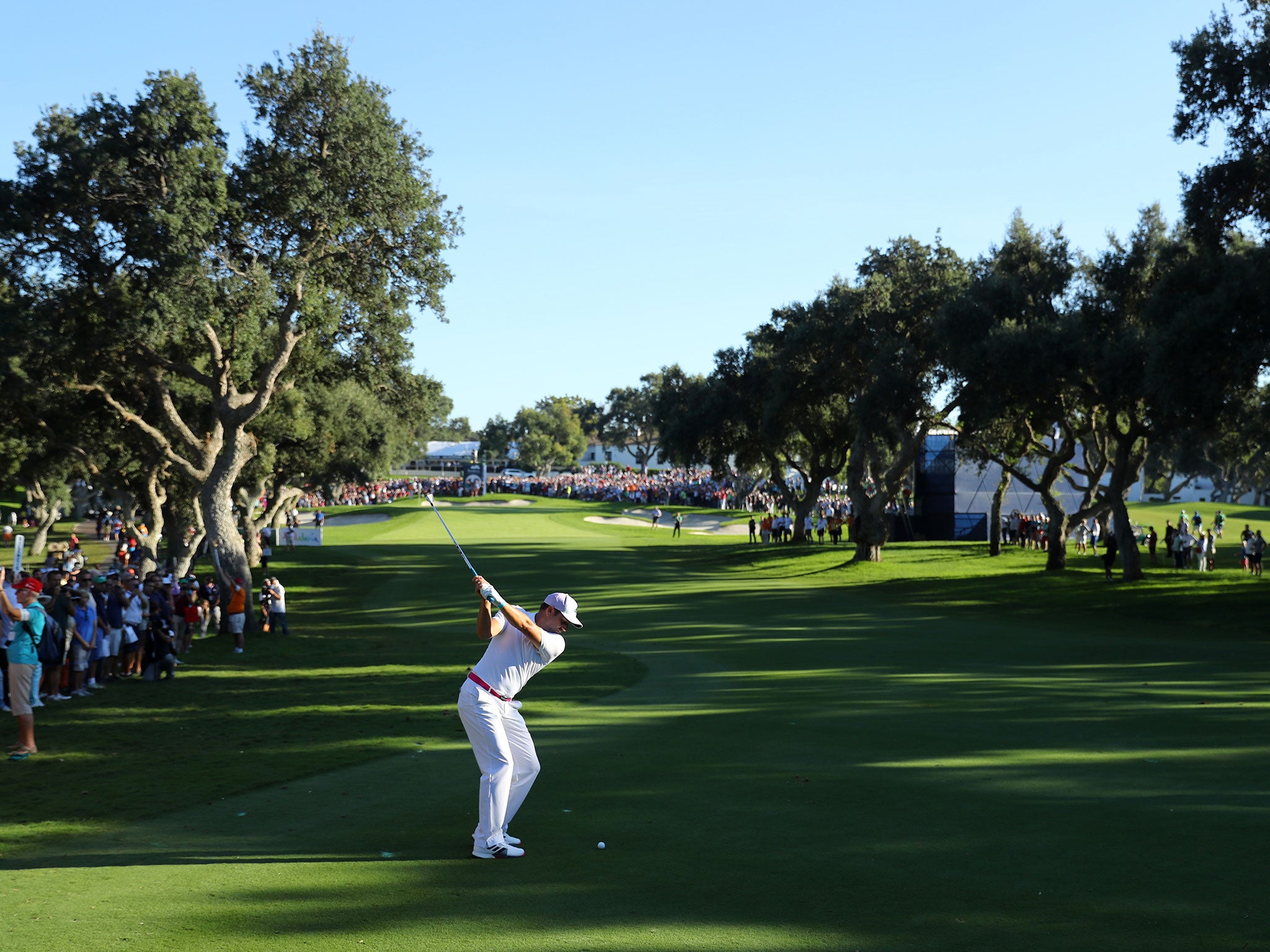 Garcia hits his second shot on the 18th hole during the final round of of the Andalucia Valderrama Masters