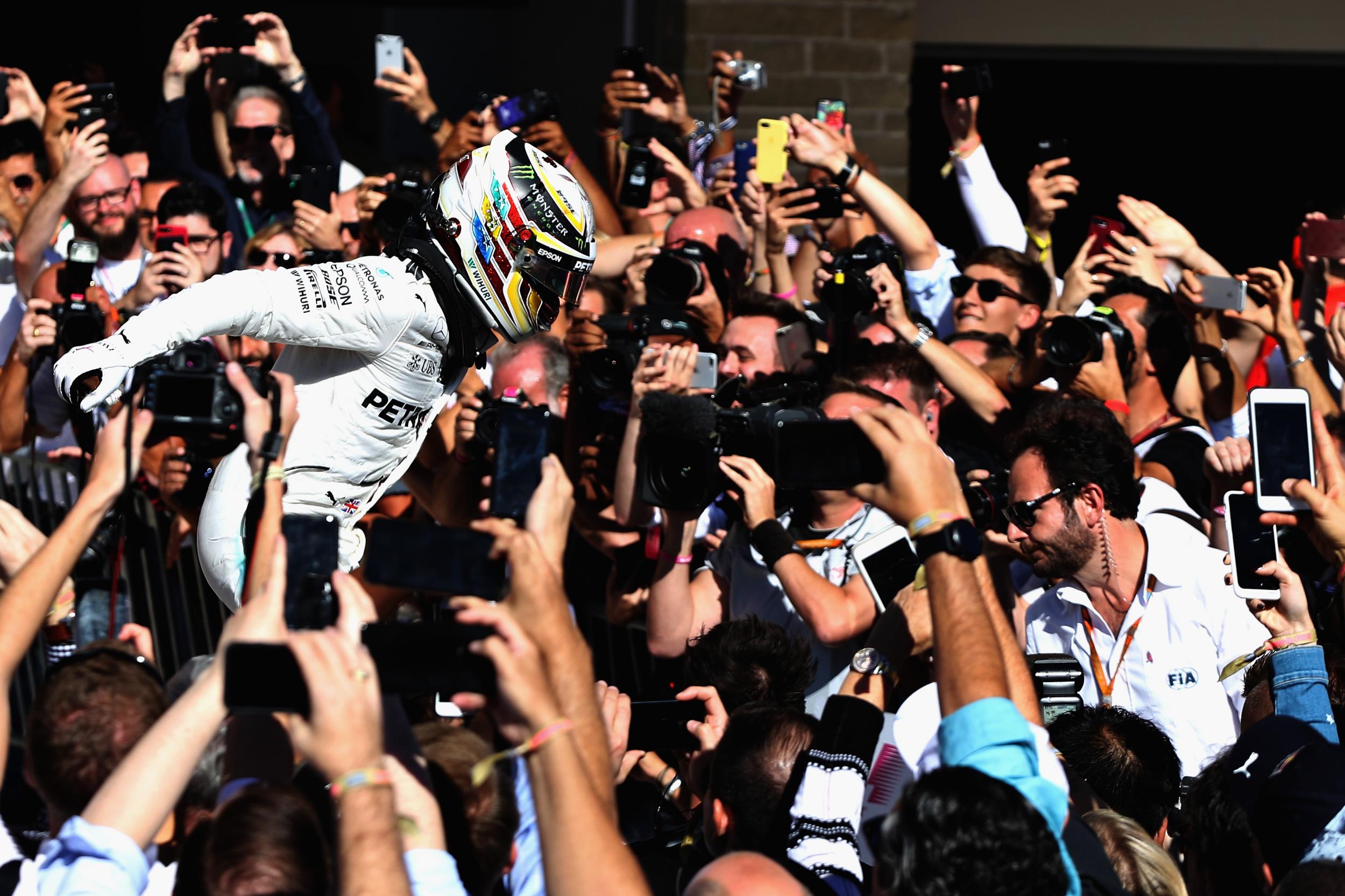 Hamilton with his fans after securing victory