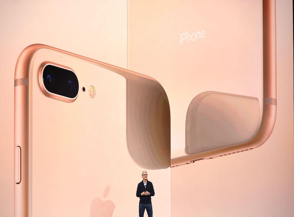 Apple CEO Tim Cook speaks about the new iPhone lineup during a media event at Apple's new headquarters in Cupertino, California on September 12, 2017