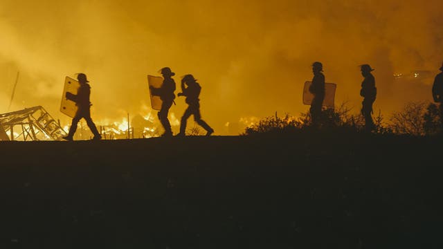 On the day of their eviction, the migrants and refugees torched the place; the aid workers took it upon themselves to be amateur firefighters