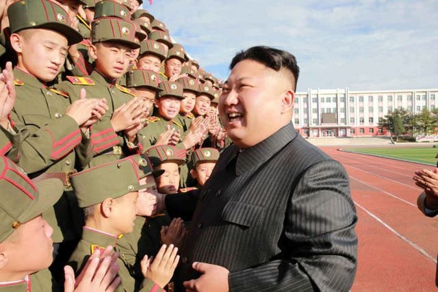 Kim Jong Un with members of the North Korean Army. The army controls the research centre where it is believed biological weapons are developed