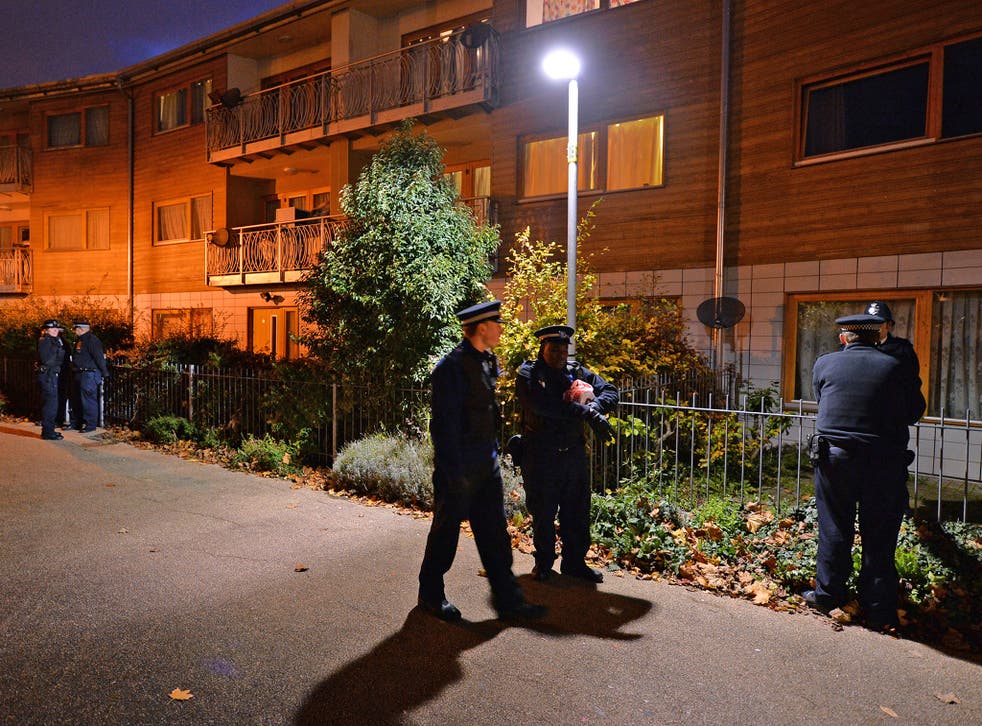 Police outside flats in Brixton, south London, in 2013. Three women had reportedly been held captive there for 30 years