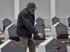 Russia asks Ukraine and Poland to stop people vandalising Soviet war