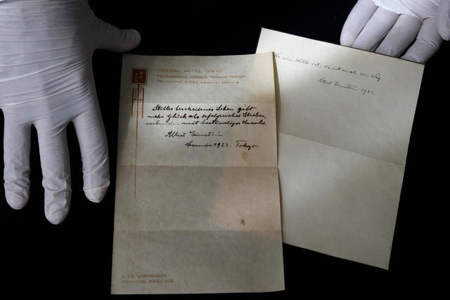Two notes written by Albert Einstein briefly describing his theory on happy living
