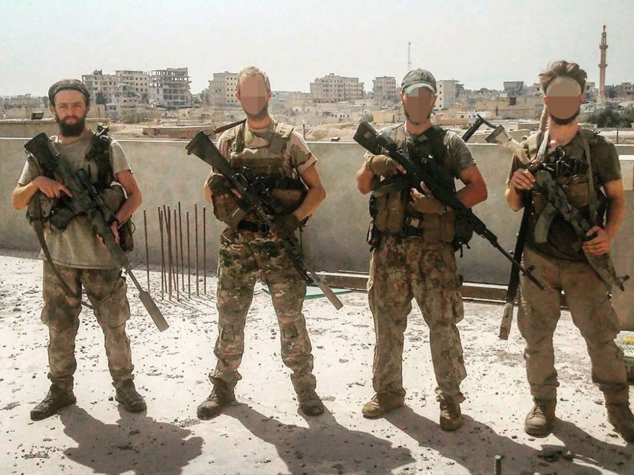 Jac Holmes (far left), a 24-year-old YPG volunteer from Bournemouth, was part of an anti-Isis sniper team in Raqqa