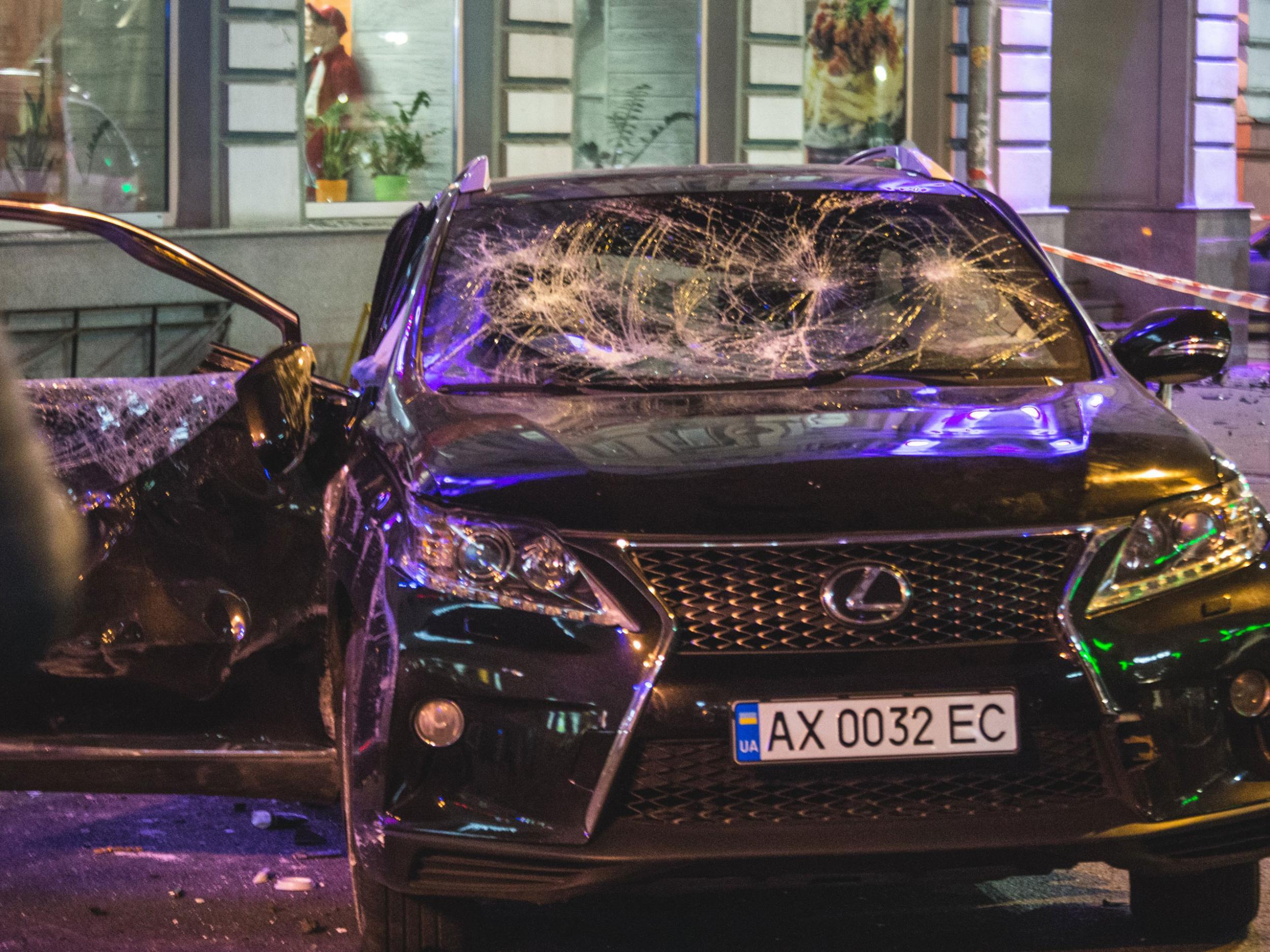 The damaged car at the scene of the road accident in Kharkiv