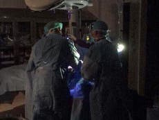 Surgery in Puerto Rico 'by phone light' as Trump gives US effort a 10