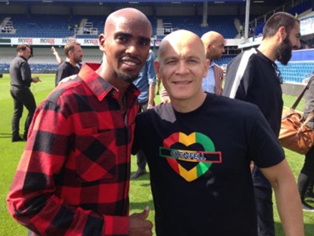 Firefighter David Badillio with Mo Farah at the Game for Grenfell