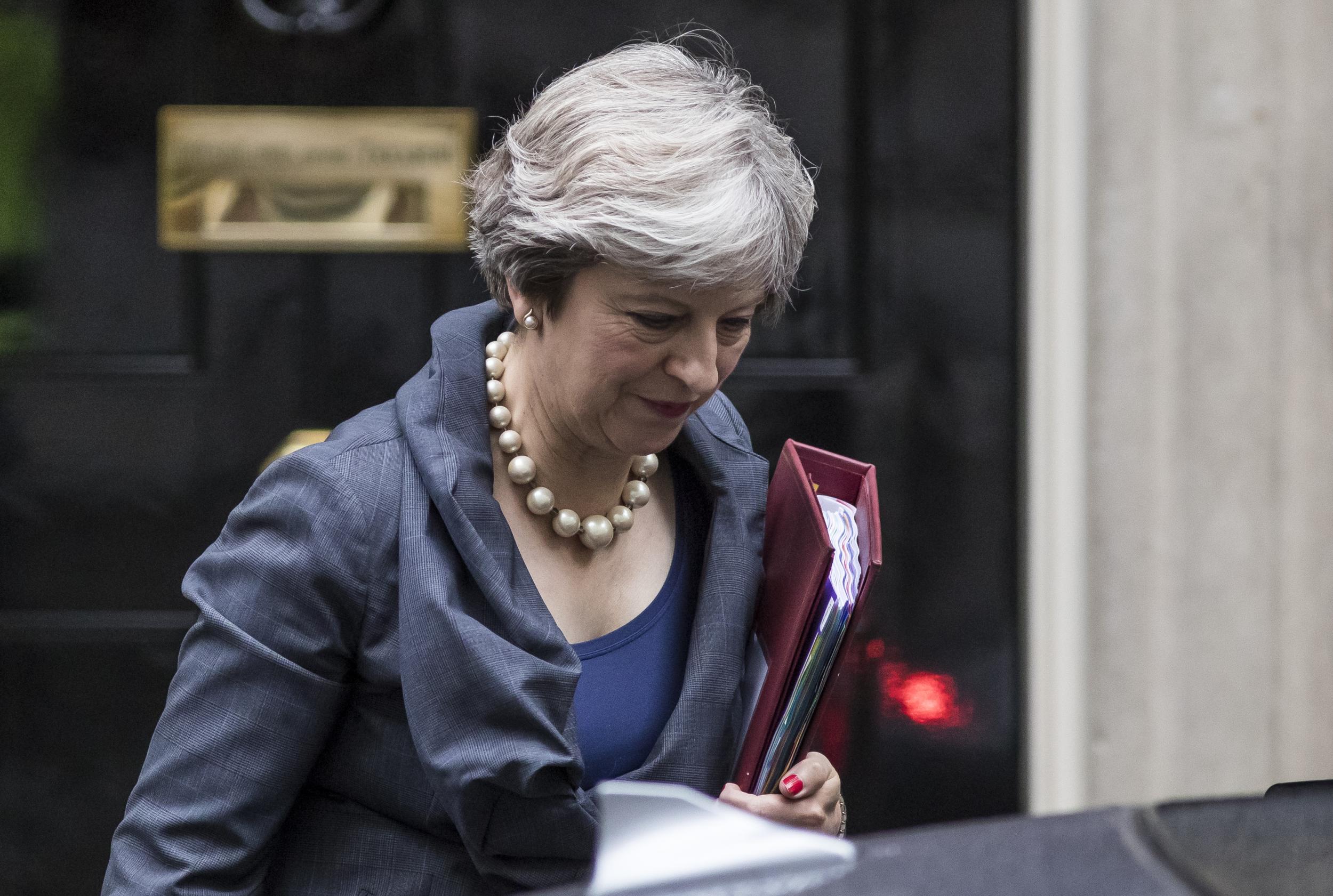 Theresa May faces growing pressure to tackle issues with the UC