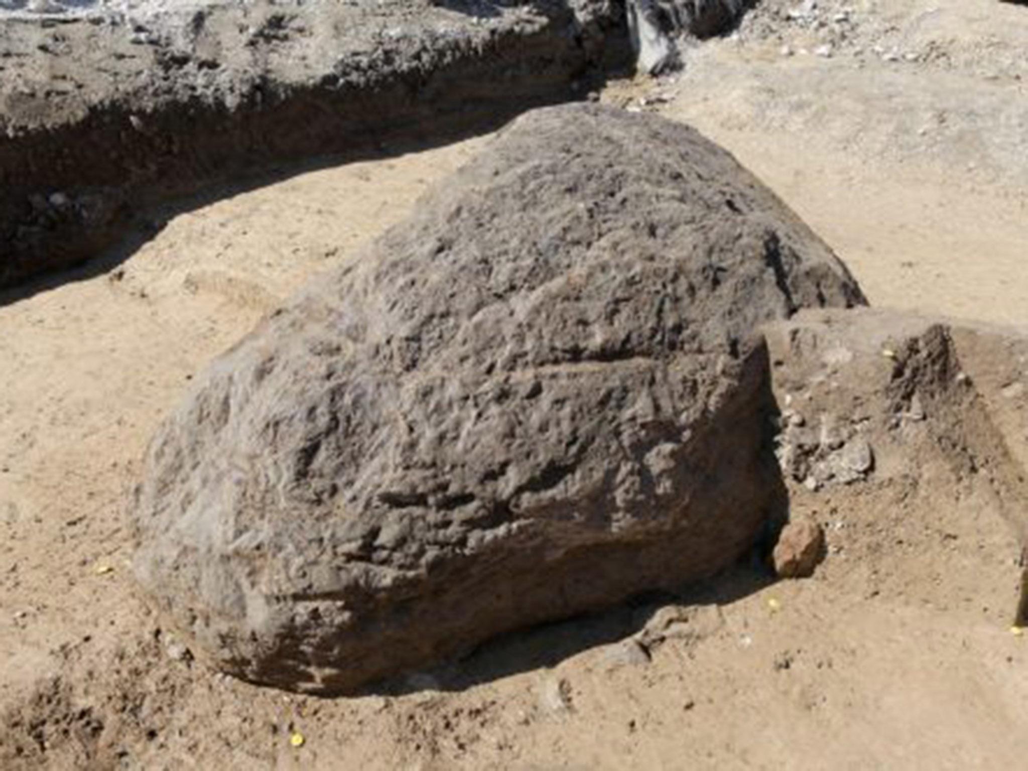 The stone is believed to have once stood vertically because of markings found on the ground near it