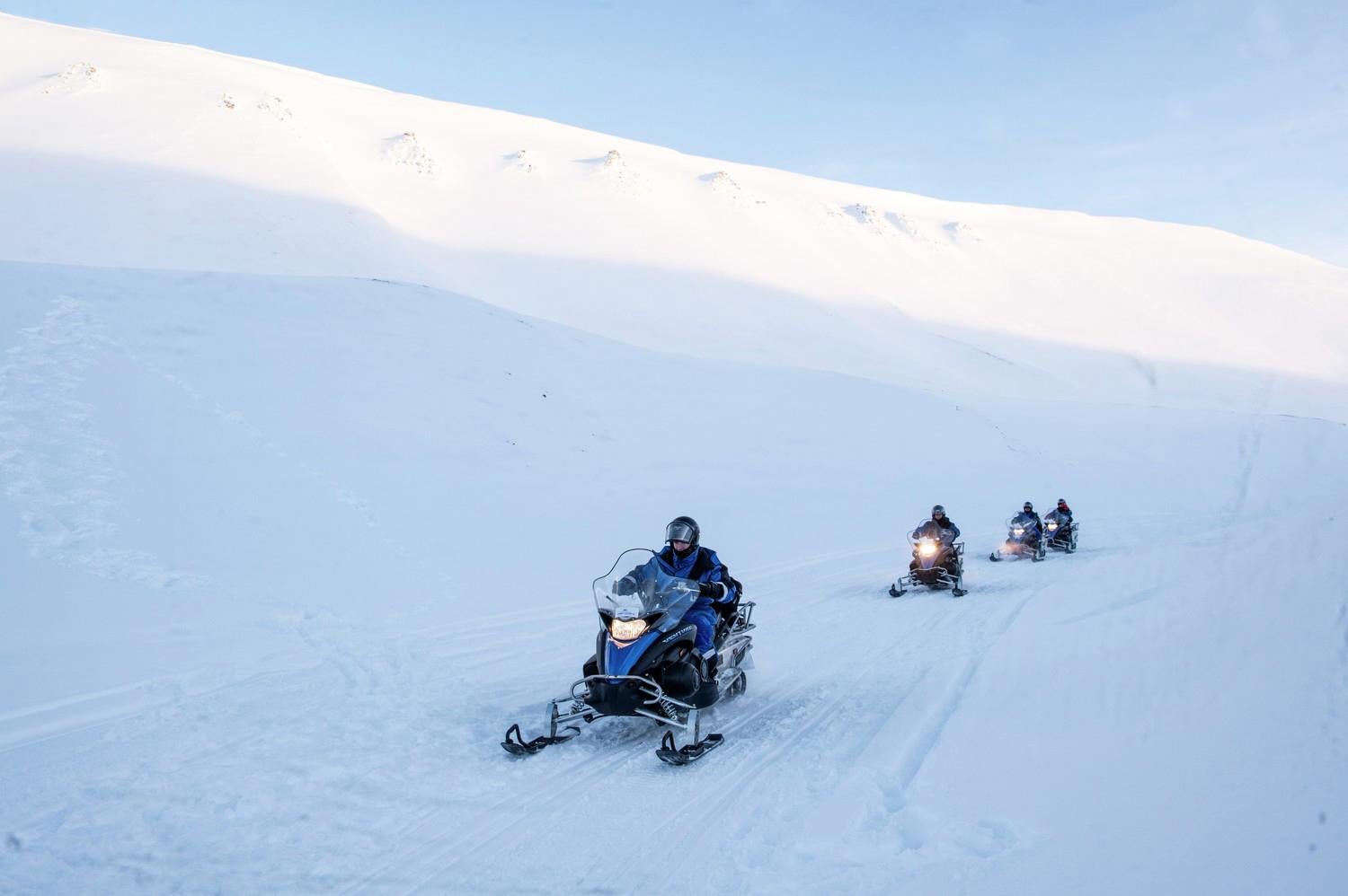 Navigate the roads on a snowmobile