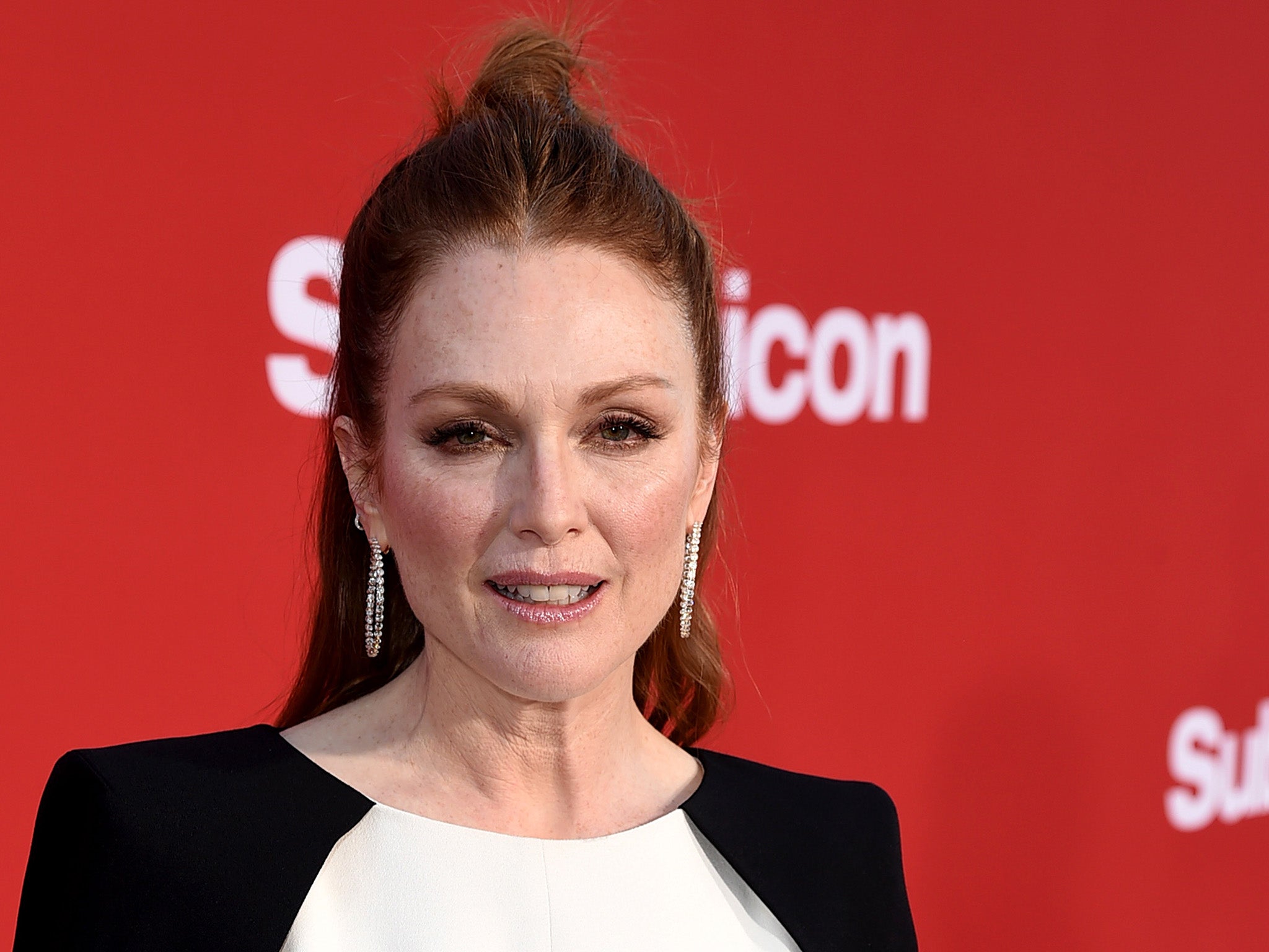 Actress Julianne Moore, pictured at the premiere of 'Suburbicon', says she hopes Harvey Weinstein will be prosecuted