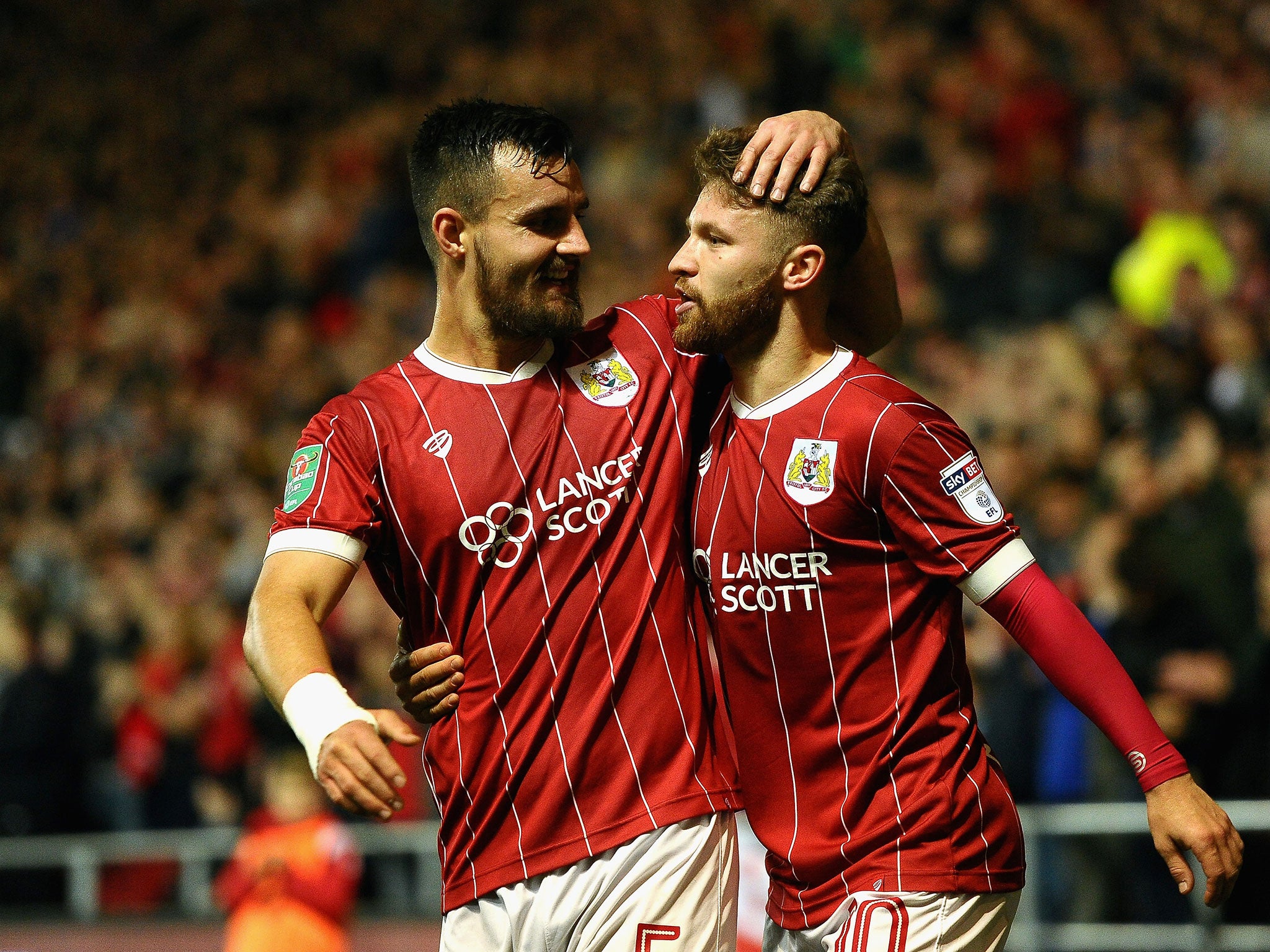 Matty Taylor celebrates after scoring his side's first goal