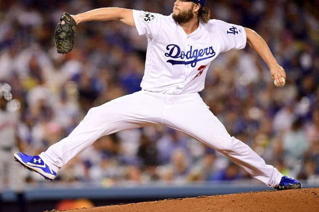 Clayton Kershaw of the Los Angeles Dodgers pitches during the seventh inning of game one of the World Series