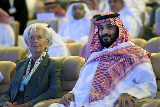 Saudi Crown Prince Mohammed bin Salman (R) and Managing Director of International Monetary Fund Christine Lagarde (L) attend the Future Investment Initiative (FII) conference in Riyadh on 24 October 2017