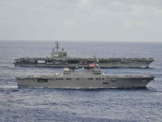 US moves aircraft carrier strike group to the western Pacific