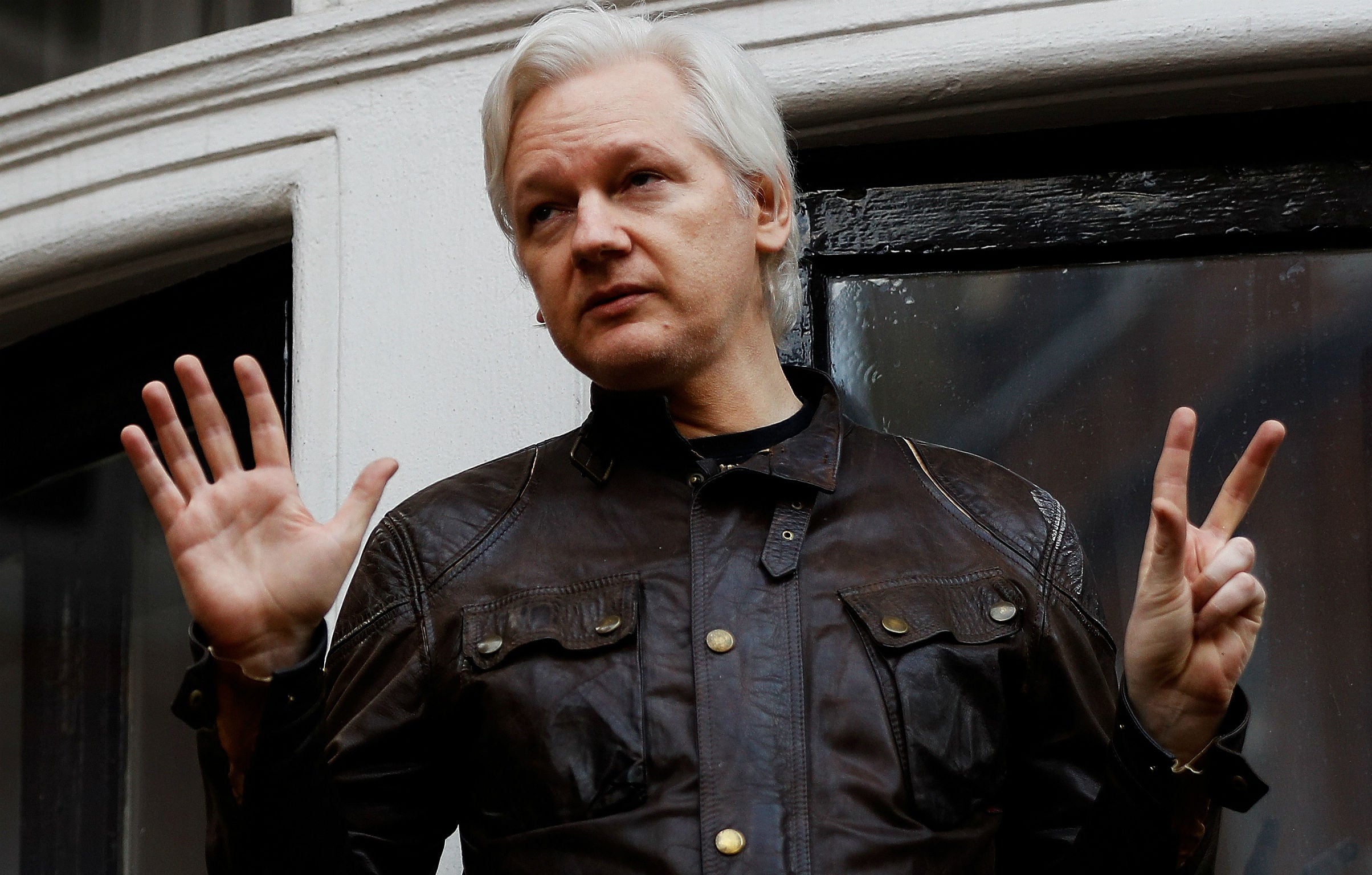 WikiLeaks founder Julian Assange is seen on the balcony of the Ecuadorian Embassy in London, 19 May 2017