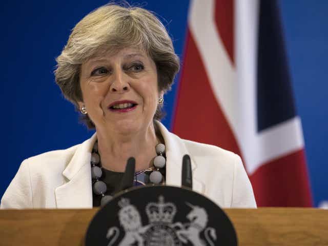 Theresa May holds a press conference on the second day of European Council meetings