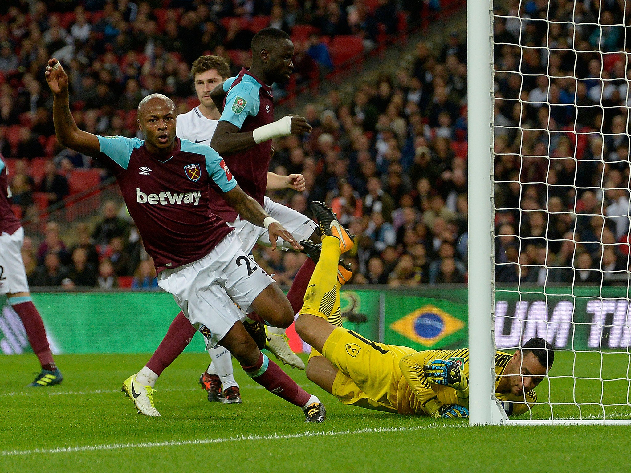 Andre Ayew wheels off to celebrate his second goal for West Ham