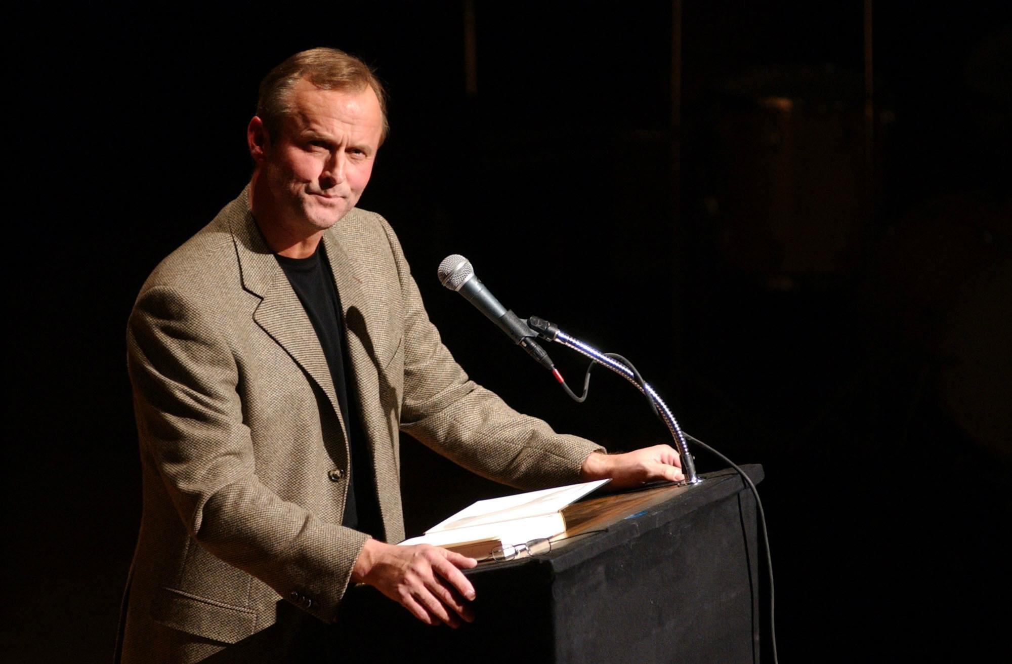 John Grisham attends a benefit reading for Frank Muller at Town Hall February 2, 2002 in New York City.