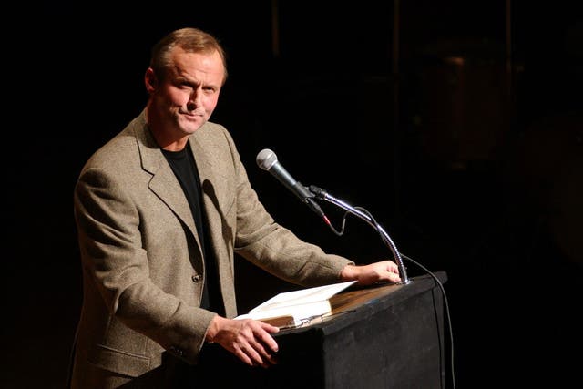 John Grisham attends a benefit reading for Frank Muller at Town Hall February 2, 2002 in New York City.