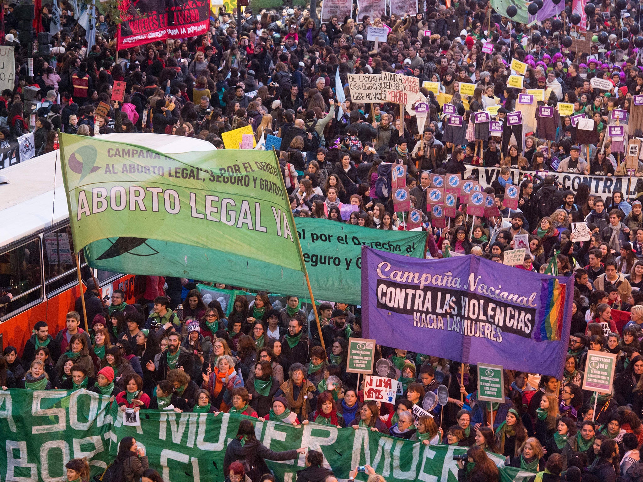 Women take part in the "Ni una menos" (Not One Less) march against gender-based violence in Argentina
