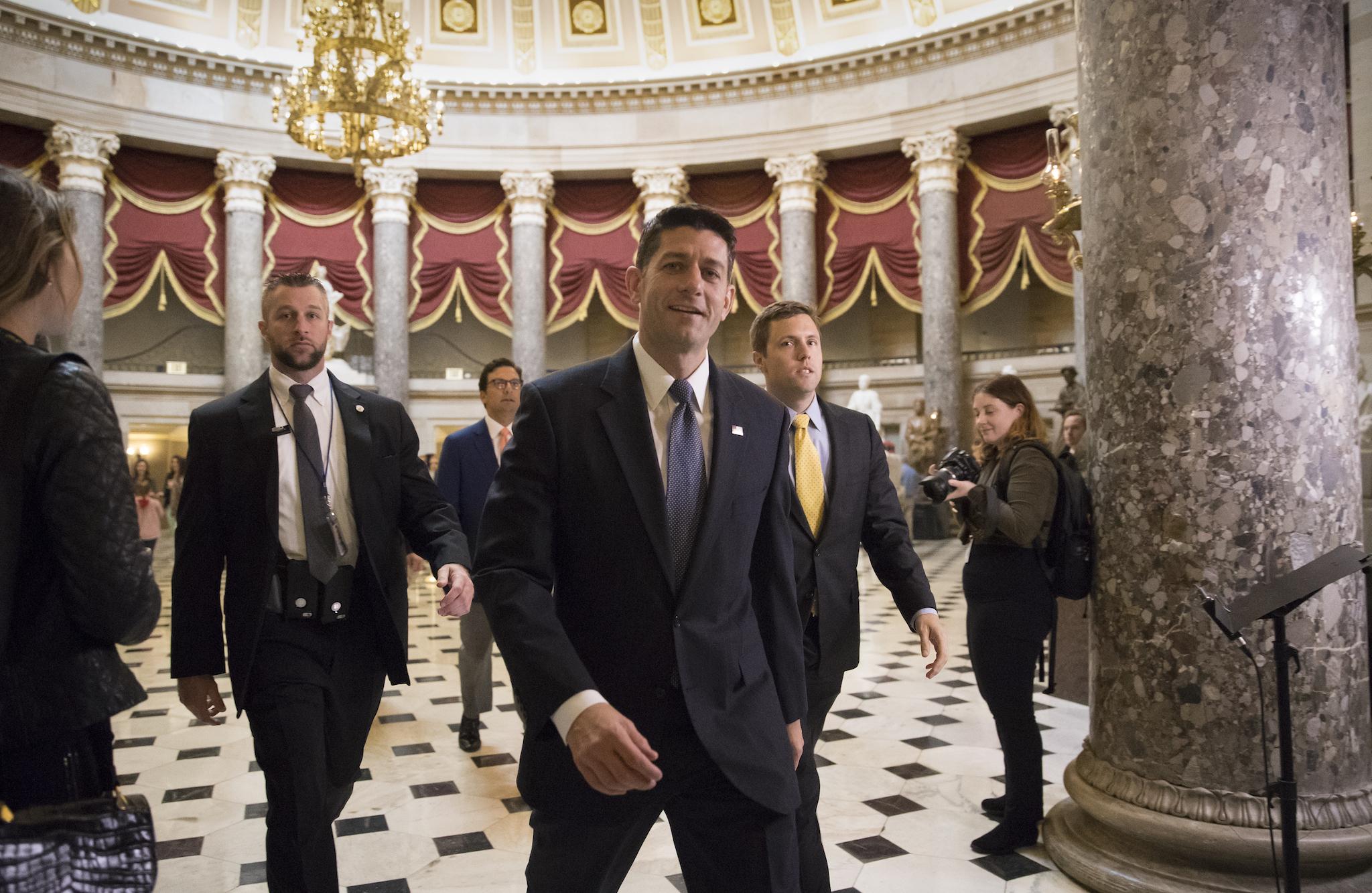 Speaker of the House Paul Ryan strides to the chamber for the vote on the $4 trillion budget measure that will pave the way for a sweeping Republican tax overhaul