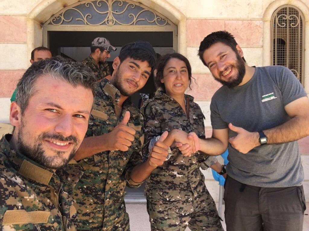 Mehmet (left) with friends in Raqqa