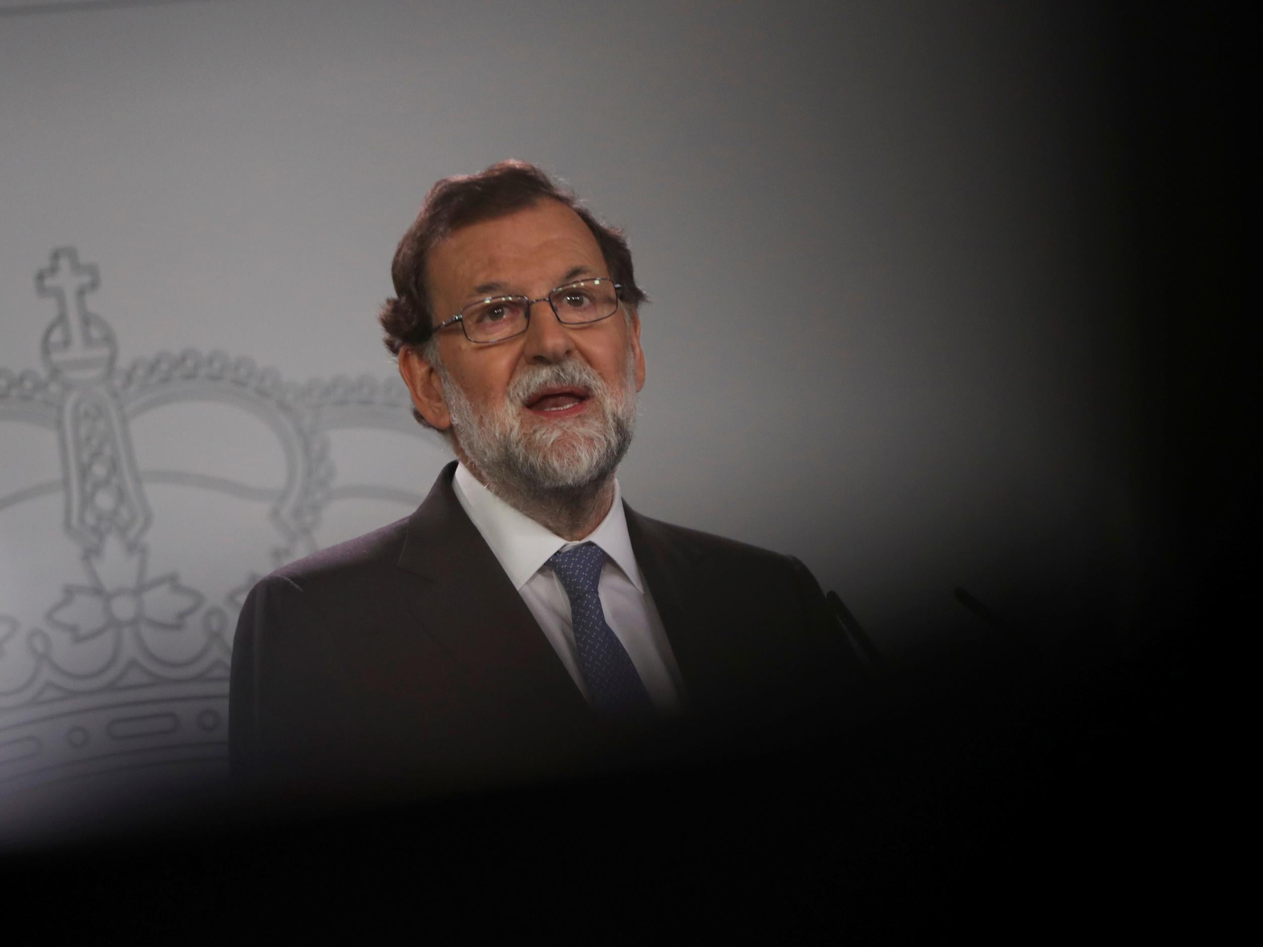 Spain's Prime Minister Mariano Rajoy delivers a statement after an extraordinary cabinet meeting at the Moncloa Palace in Madrid