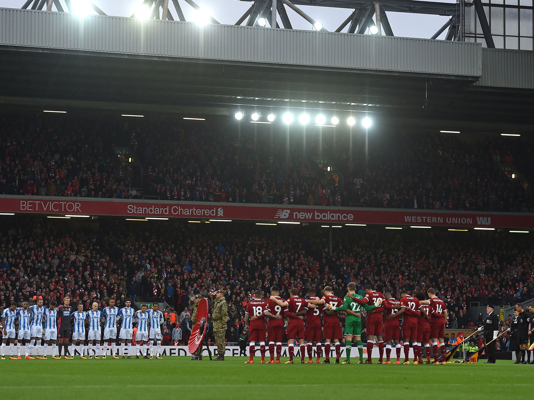 Anfield observes a minute's silence before kick-off
