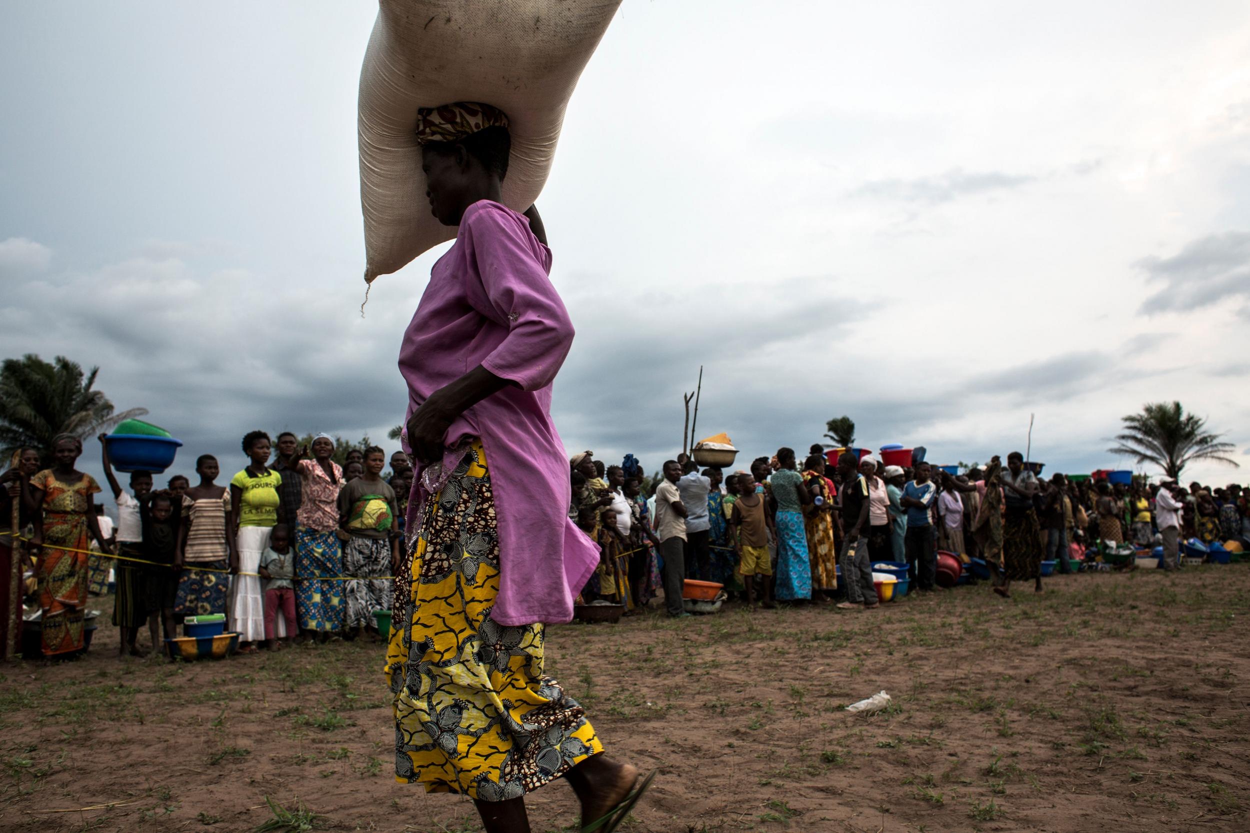 A Congolese woman carries a sack of food in Kasala (AFP/Getty)